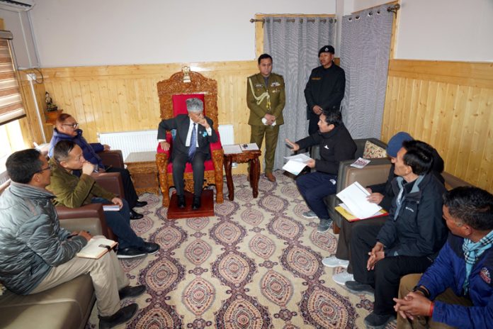 A delegation led by ex-MP Namgyal during meeting with LG Brig Mishra in Leh.