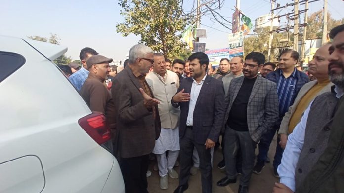 MLA Sham Lal Sharma and JMC Commissioner Dr Devansh Yadav during a tour of Jammu North.