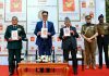 Union Minister Kiren Rijiju, CDS Anil Chauhan and LG Ladakh Brig Dr BD Mishra (Retired) launching the latter’s book in New Delhi.