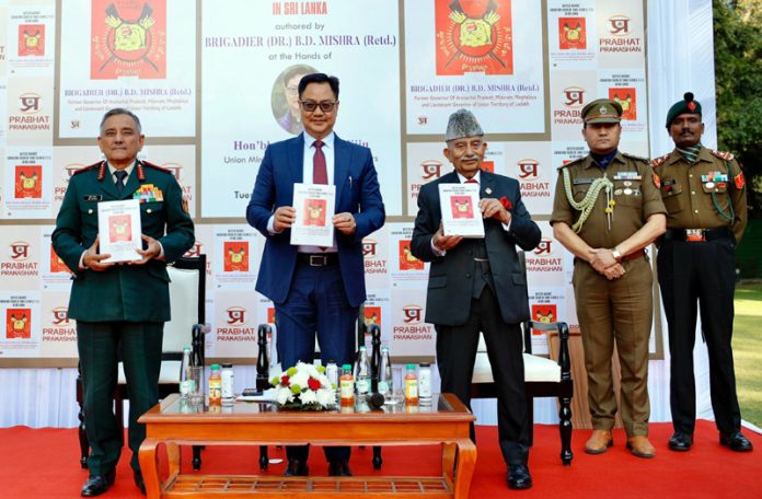 Union Minister Kiren Rijiju, CDS Anil Chauhan and LG Ladakh Brig Dr BD Mishra (Retired) launching the latter’s book in New Delhi.