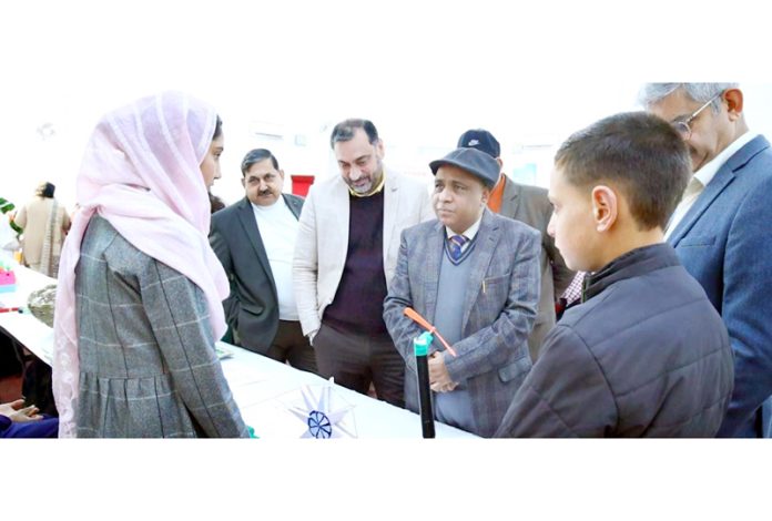 Principal Secretary, School Education, Suresh Kumar Gupta interacting with students during exhibition.