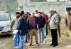 MLA Sham Lal Sharma along with officials of various departments inspecting a road in Purkhoo area of Jammu North constituency.