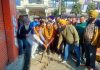 MLA Bahu, Ch Vikram Randhawa kick starting construction of lane and drain in Sanjay Nagar on Saturday.