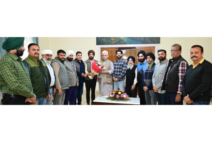 A delegation of AJKTWA led by KS Wazir during meeting with Lt Governor Manoj Sinha in Jammu.