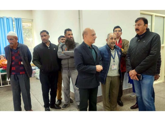 MLA Arvind Gupta interacting with doctors at GMC, Jammu on Monday.