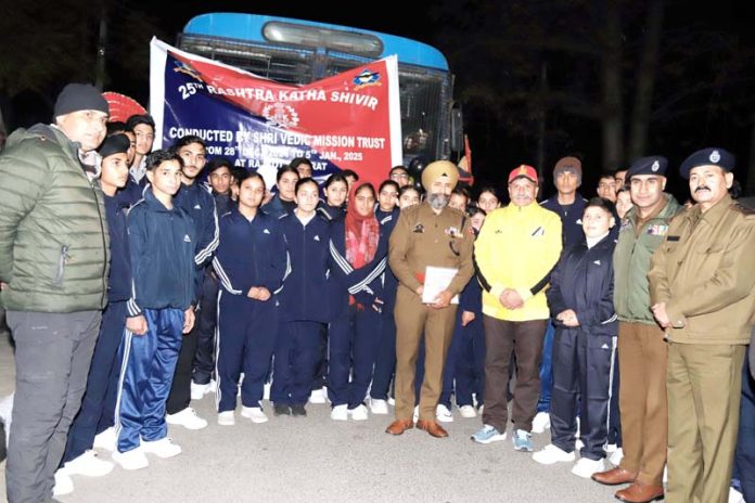 DIG JSK Range, Shiv Kumar Sharma, flagging off a group of students for the 25th Rashtra Katha Shivir Yatra from Jammu on Thursday.