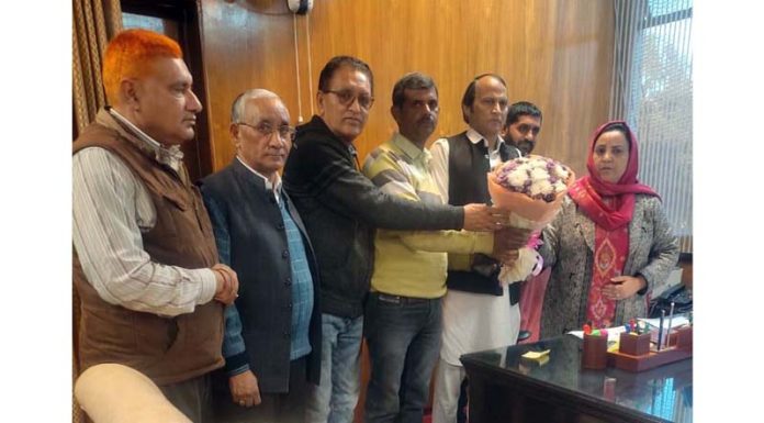 A delegation of Lecturer Forum meeting with Education Minister in Jammu on Saturday.