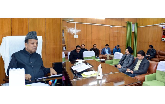 Speaker Legislative Assembly chairing a meeting.