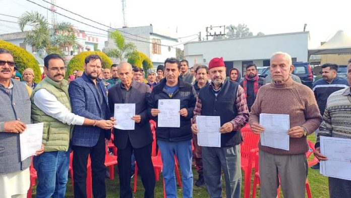 BJP MLA from Jasrota, Rajiv Jasrotia during a membership drive in his constituency on Sunday.