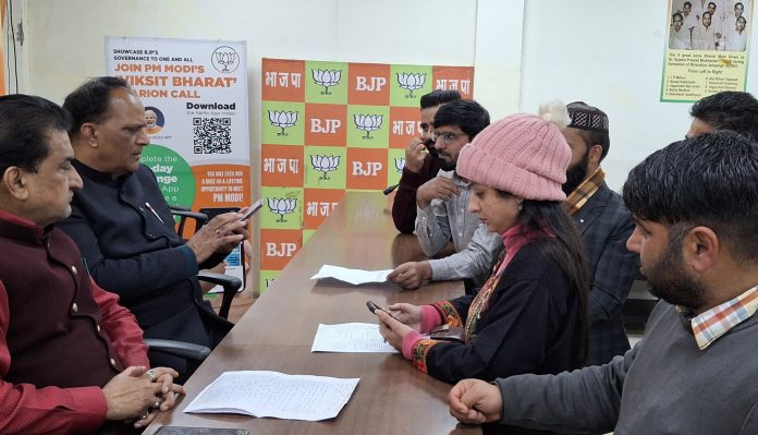 BJP leaders listening public grievances at party office Jammu on Tuesday.