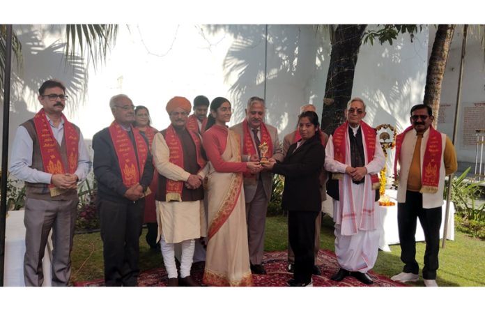 Dignitaries giving prizes to winners of Speech Competition at Shri Lakshmi Narayan Mandir, Gandhi Nagar Jammu on Monday.