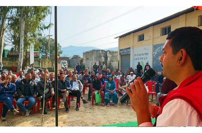 MLA Ranbir Singh Pathania addressing meeting of Daily Wagers in Udhampur on Monday.