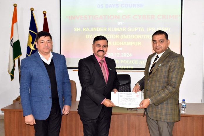 Dignitary presenting certificate to participant during a five-day course on ‘Investigation of Cyber Crime’ at SKPA Udhampur.