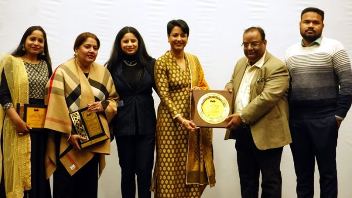 Dr. Parveen Kataria, DG Aryans Group of Colleges felicitating Maninder Kour and Zanat Sood during a function held on Friday.