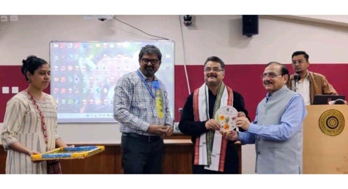 Prof Yash Pal receiving memento during international conference at the University of Calcutta.