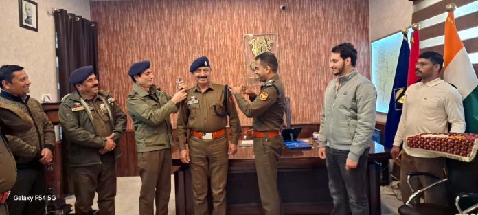 SSP Kathua Shobhit Saxena pinning ranks to the newly promoted DySPs at DPO Kathua on Tuesday.