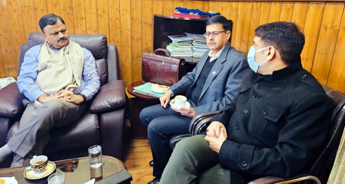 Minister Javed Ahmad Rana interacting with officers.