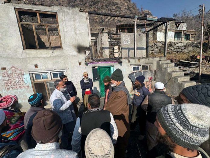 Ex-minister GM Saroori interacting with people in Bunjwah area of Kishtwar.