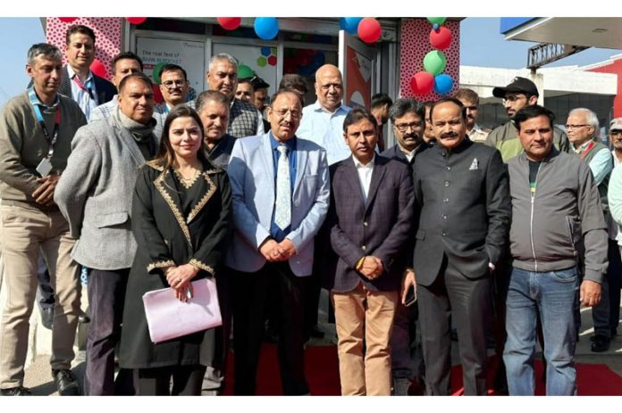 MLA Kathua Dr. Bharat Bhushan, Bank officials and others posing during the inaugural event of J&K Bank's ATM at SICOP Complex, Kathua.