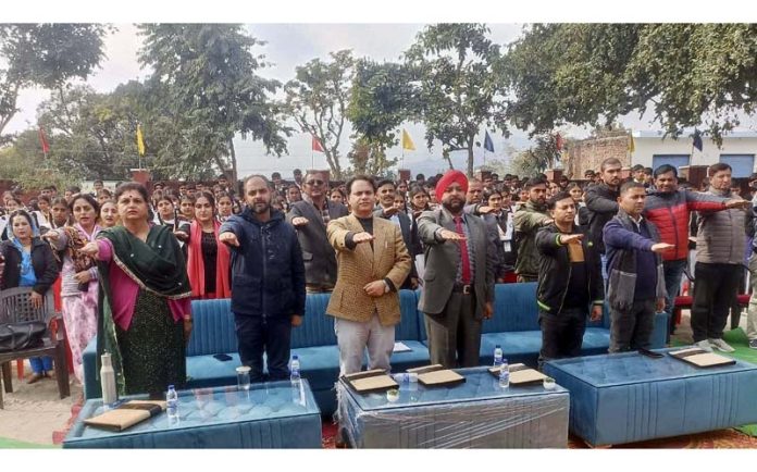 Guests administrating a pledge during a function held in Akhnoor on Wednesday.