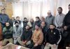 Senior RSS leader Ram Lal posing with MRM activists of Kashmir during a meeting at Srinagar on Friday.