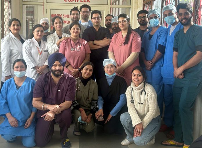 A team of doctors of GMC Jammu posing together after performing an advance laparoscopic procedure on a 2-year old boy.