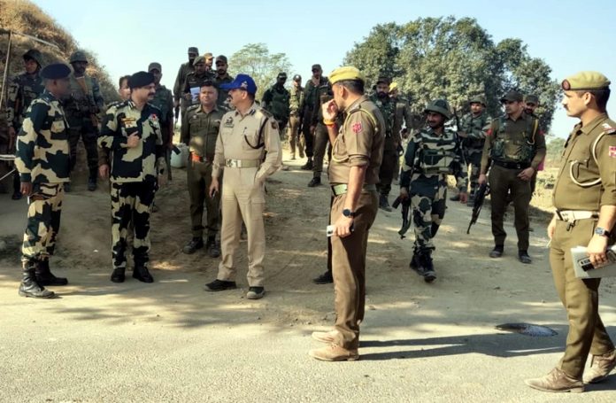 Police and BSF officers during joint patrolling along Indo-Pak border in Ghagwal-Samba Sector on Friday.