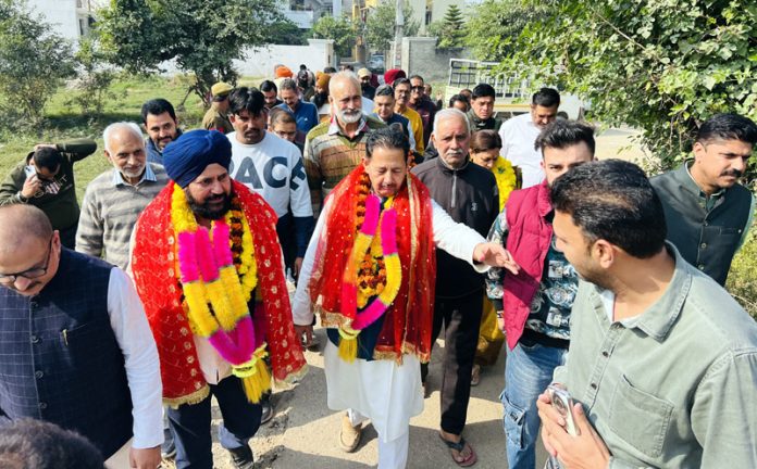 MLA Jammu South, Dr Narinder Singh and former Dy Mayor Jammu, Baldev Singh Billawaria kick starting development works in Gangyal on Friday.