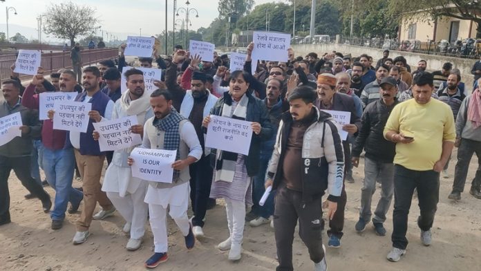 Protesting Congress workers marching towards Udhampur Railway Station on Saturday.