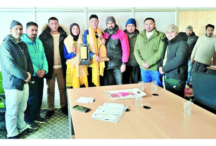 Joint Director, Youth Services and Sports, Ladakh, along with other dignitaries felicitating Zahra Batool and Dilshad Ali for their outstanding achievements in the 68th National School Games.