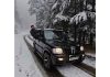 Tourists enjoying on a snowy road after fresh snowfall in Bhaderwah. -Excelsior/Tilak Raj