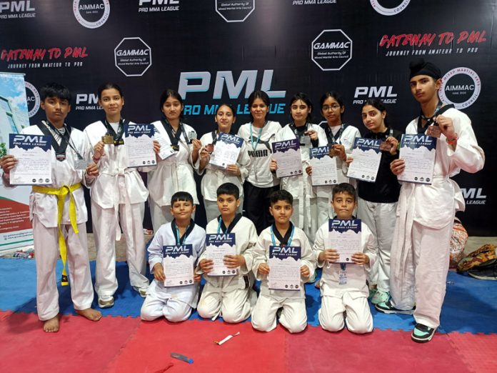 Students of Jammu Sanskriti School Jammu posing during National MMA (Mixed Martial Arts) Championships at Maharashtra.