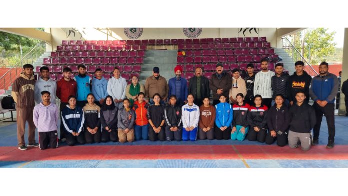 J&K Kabaddi players pose for group photograph with others before leaving for Haridwar for participating in 50th Junior National Kabaddi Championship.