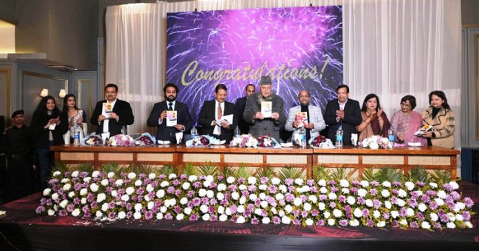 Dr Farooq Abdullah and other dignitaries during the launch of Ashu Bansal's poetry book at KC Emporia in Jammu.