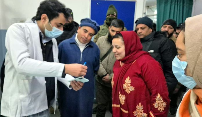 Minister Sakina Itoo along with officers reviewing medical facilities in a hospital at Rainawari.