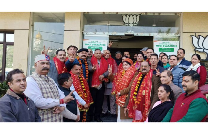 BJP president Sat Sharma addressing newly elected Mandal presidents on Wednesday.