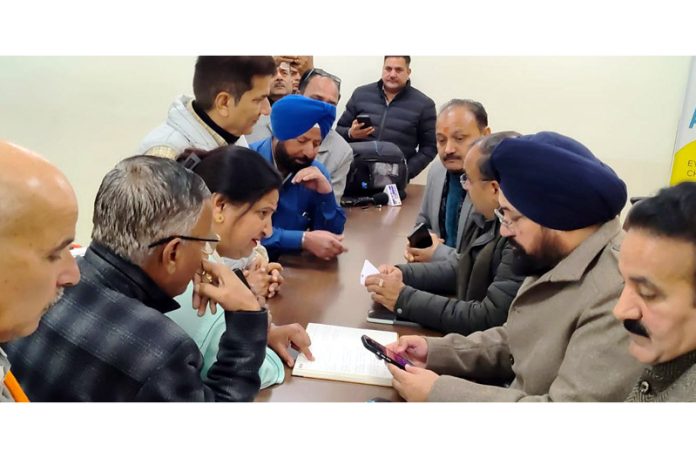 BJP MLAs listening grievances of people in a public darbar at Jammu on Wednesday.