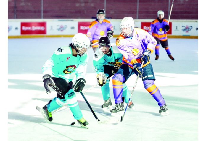 Ice Hockey players in action during a match at Leh on Friday.