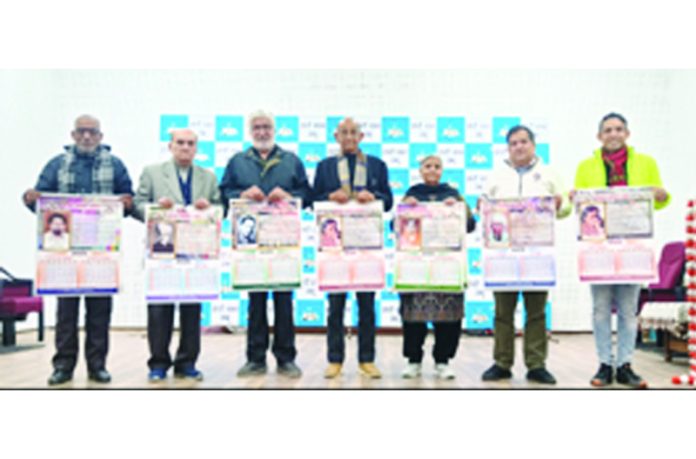 Members of Dogri Sanstha releasing Dogri calendar for 2025 on Wednesday.