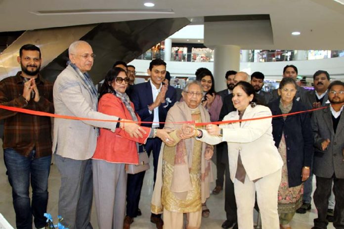 Dignitaries and staff of Kwality Opticians during opening of its new showroom at Wave Mall, Jammu. -Excelsior/Rakesh