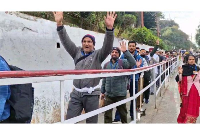 Enthusiastic pilgrims head towards Shri Mata Vaishno Devi Ji shrine on Tuesday.