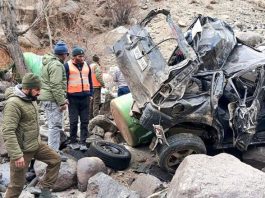 A vehicle badly damaged in accident at Kargil on Tuesday. —Excelsior/Basharat Ladakhi