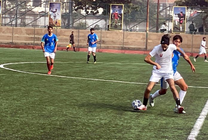 Players in action during first match of Day 3 at Mini Sports Stadium Parade.