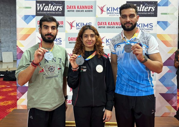 Fencers of J&K posing along with medals during 35th Senior National Fencing Championship (Men & Women) 2024-25 in Kannur, Kerala.