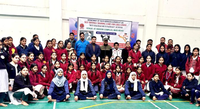 Girls posing along with dignitaries during self-defence camps at Reasi.