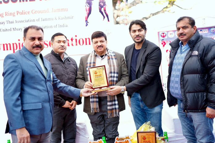 Association members presenting memento to dignitary during North Zone Muay Thai Championship at Jammu on Monday.