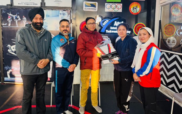 MP Haji Hanifa Jan felicitating Taekwondo players in Jammu on Tuesday.