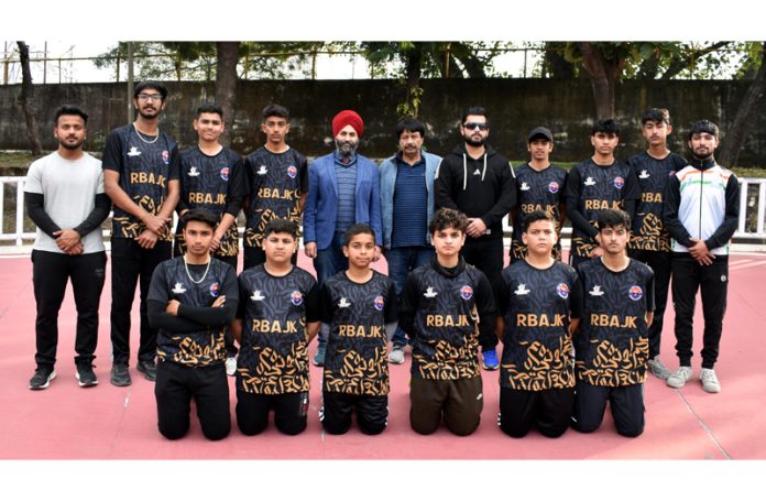 J&K Junior Rollball team posing along with management.