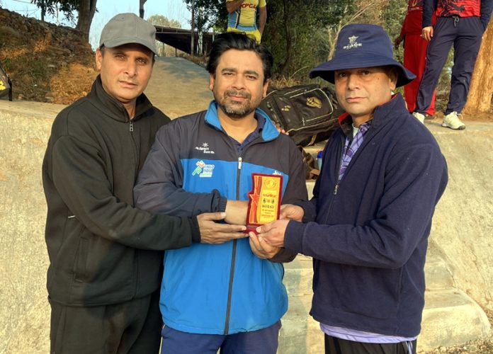 Player receiving award during a mat at Jammu on Sunday.