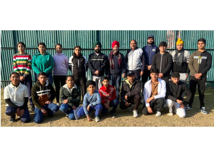 Selected Archery team of J&K posing along with dignitaries.